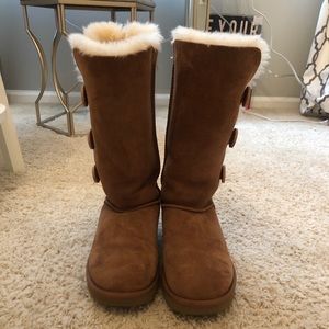 Tall Ugg boots with buttons